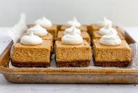 Creamy Pumpkin Cheesecake Bars with Gingersnap Crust