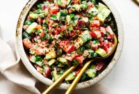 Tomato and Cucumber Salad with Creamy Tahini Dressing