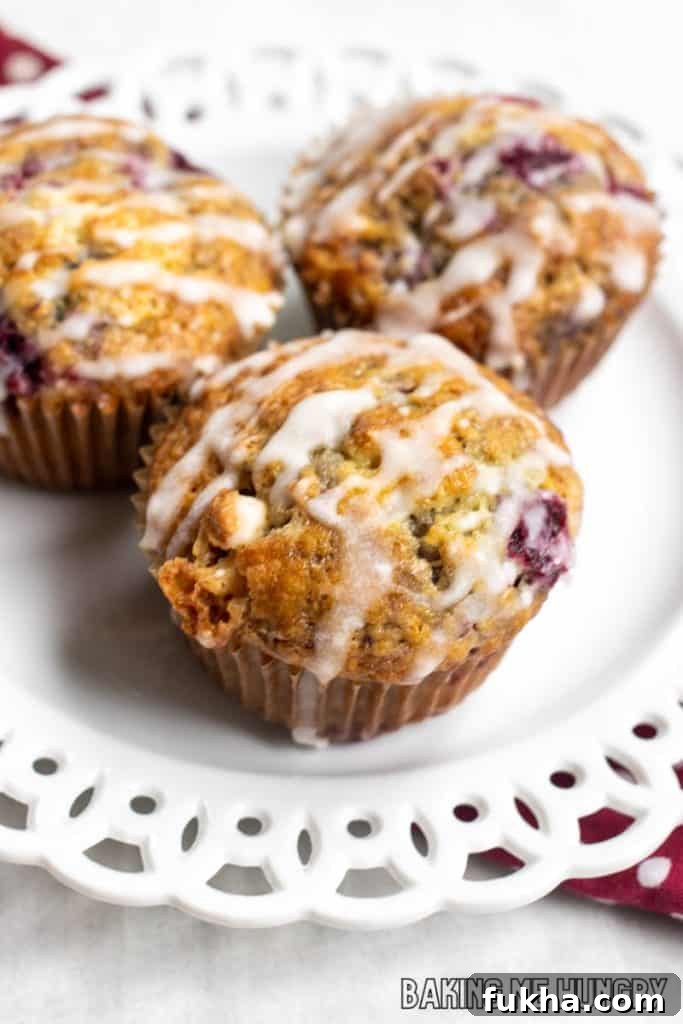 raspberry white chocolate muffins recipe on white plate
