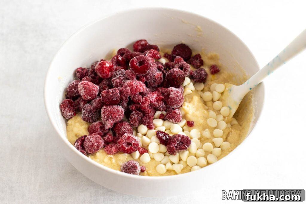 berries and chips added to bowl