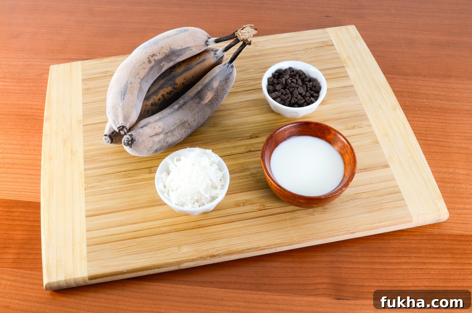 Banana ice cream in bowl with chocolate chips and coconut