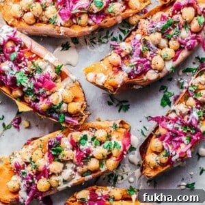 baked sweet potatoes stuffed with chickpeas, red cabbage, and za'atar
