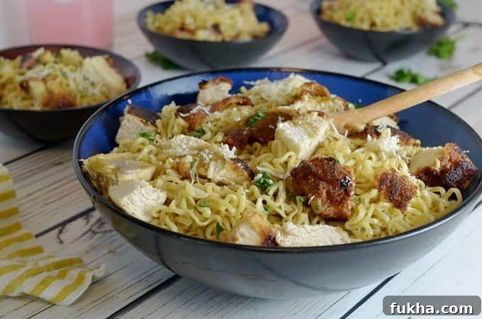 four bowls of ramen noodles with crispty chicken.