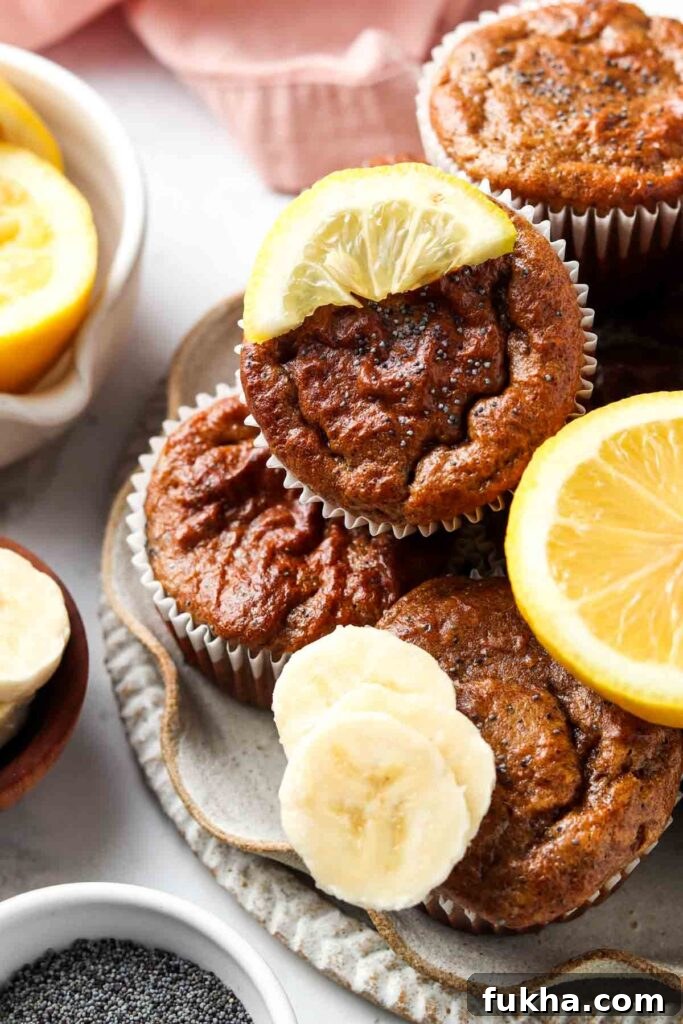 healthy poppyseed muffins 1 1 poppyseed muffins on a plate with lemons