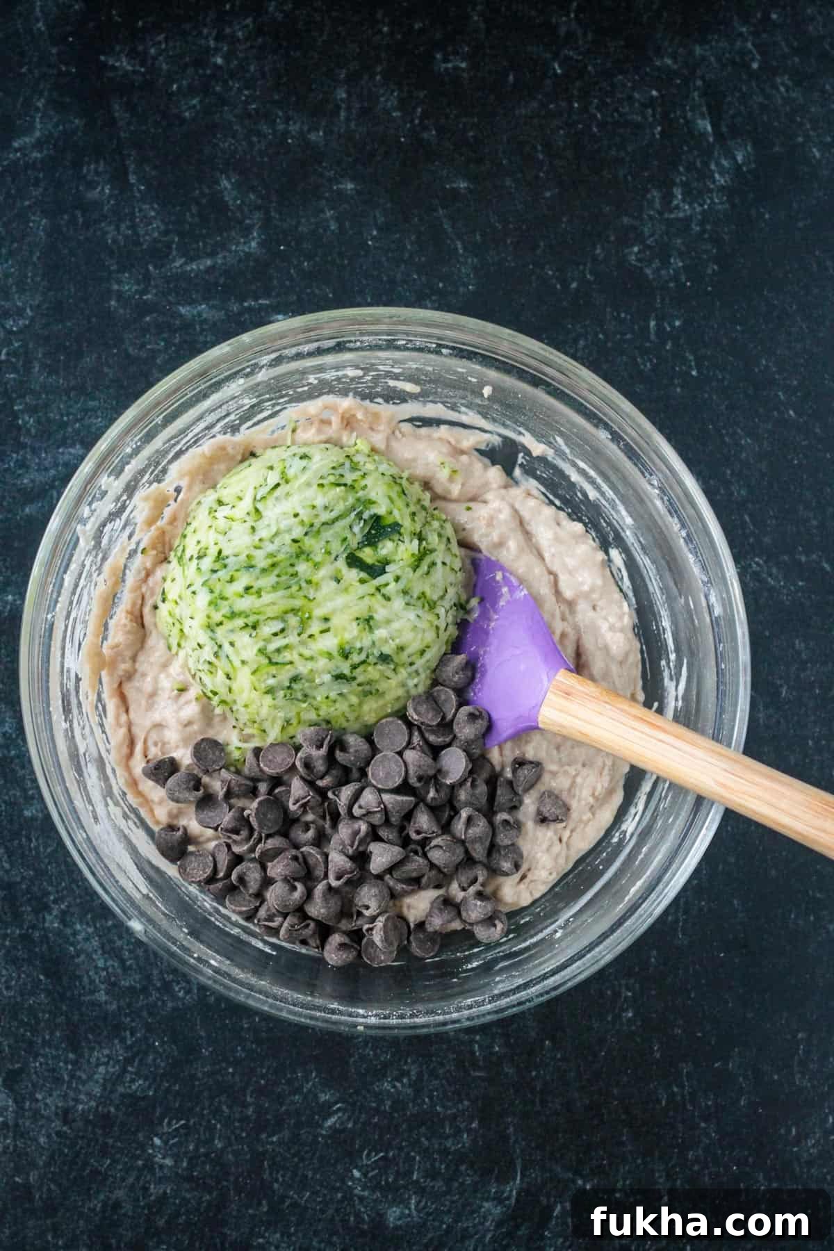 Shredded zucchini and chocolate chips added to the batter.