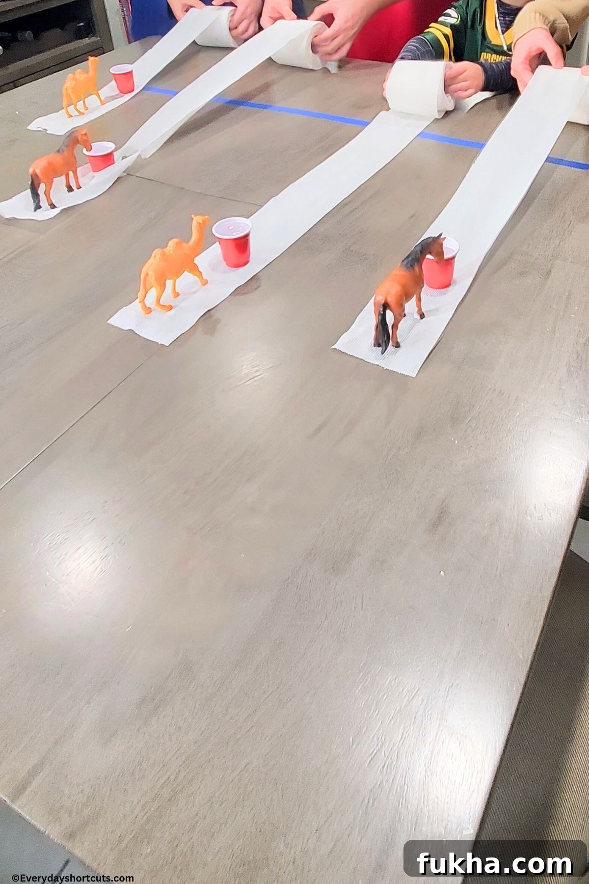 toilet paper derby race on kitchen table