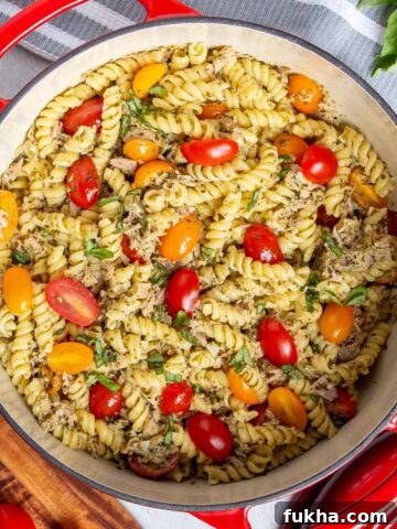 One-Pot No-Boil Mac and Cheese 9 Tuna pesto pasta in a 6-quart dutch oven garnished with fresh basil.