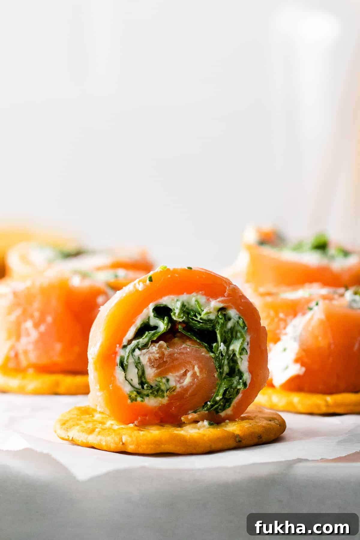 Smoked Salmon Pinwheels Recipe with Cream Cheese and Dill 7 salmon pinwheel on cracker