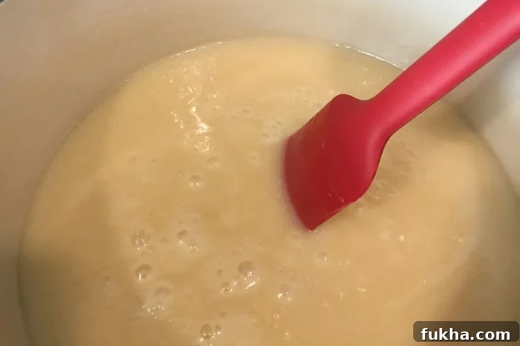stir butter sugar and milk in dutch oven for fantasy fudge