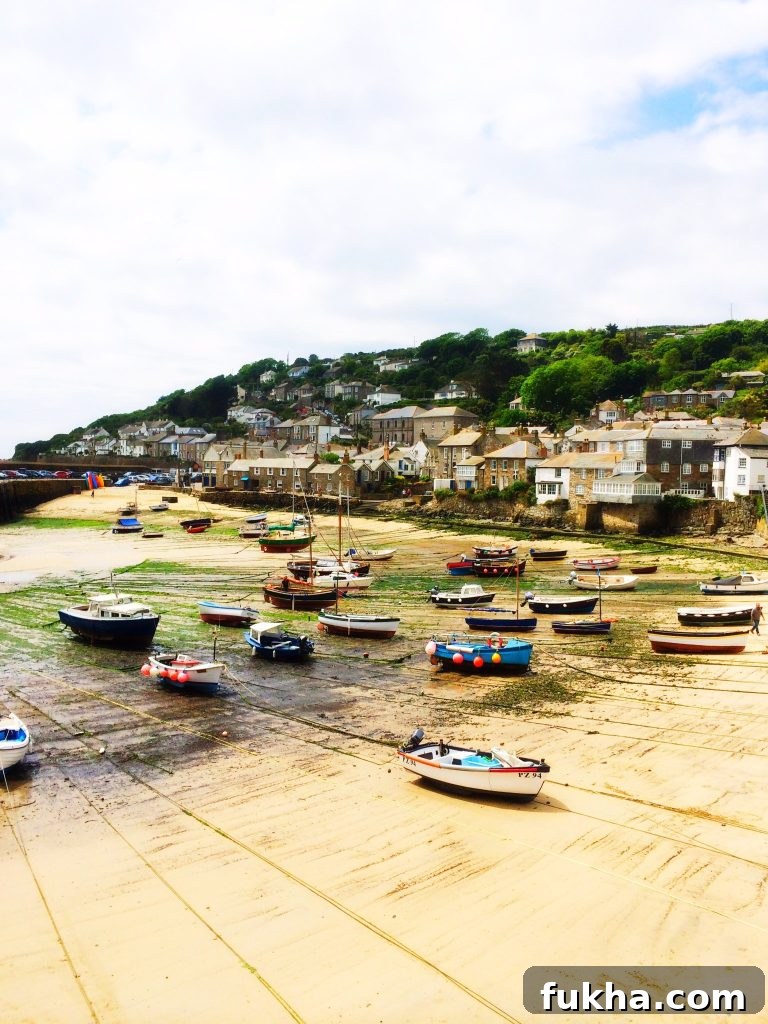 Mousehole harbour, fishing harbour cornwall, Mousehole Cornwall, fishing boats at low tide Cornwall, Days out in Cornwall, Places to visit in Cornwall, picturesque Cornish fishing village, Daisies & Pie, Daisies and Pie, 