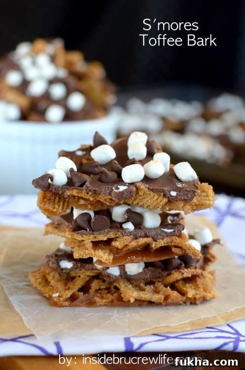 Golden grahams, chocolate, and mini marshmallows give this toffee bark a fun and delicious s'mores twist. Golden grahams, chocolate, and mini marshmallows give this toffee bark a fun and delicious s'mores twist.