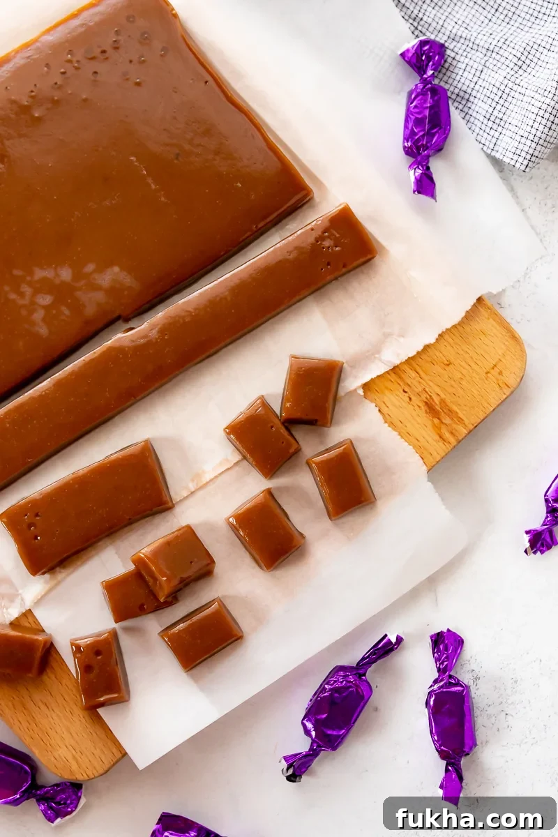 How to Make Chai Tea Caramels at Home 5 flatlay of chai tea caramels packaging process with cut and uncut caramels surrounded by wrapped caramel candies