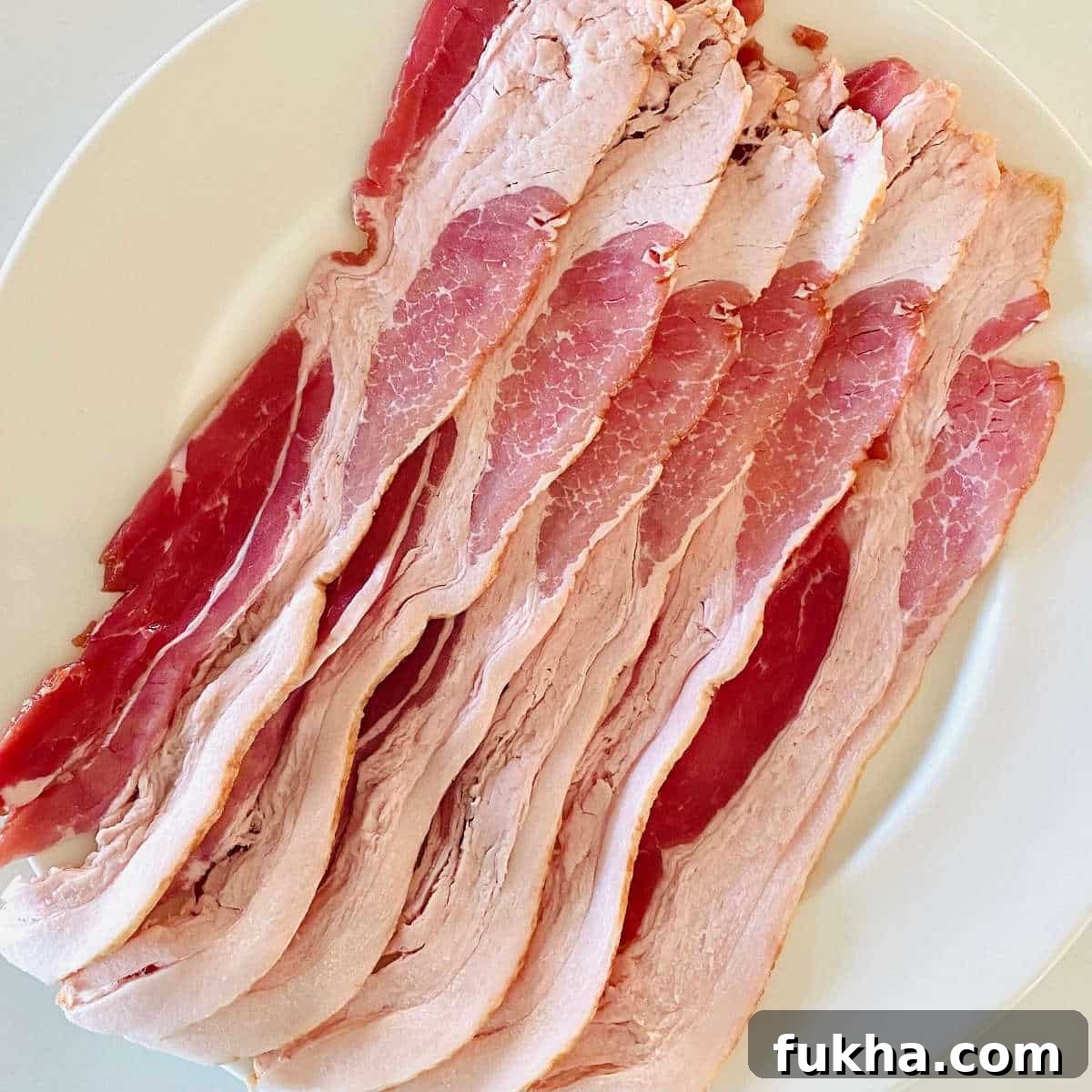 How to Cook Crispy Bacon on a Blackstone Griddle 4 raw bacon to cook on Blackstone griddle.