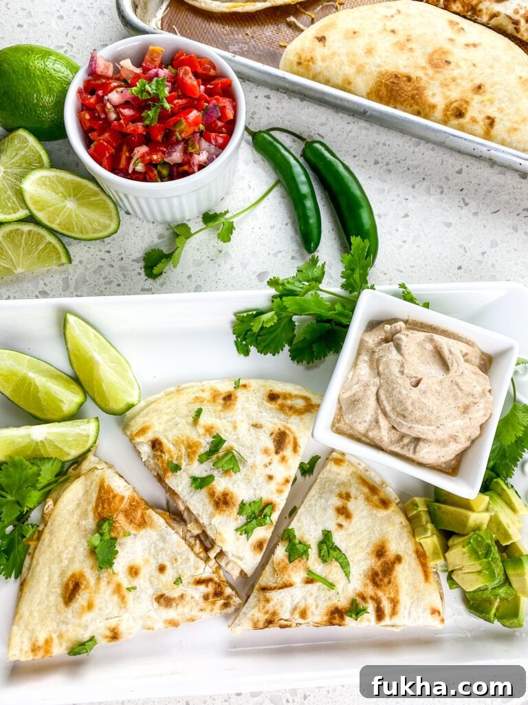 A platter of chicken quesadillas.