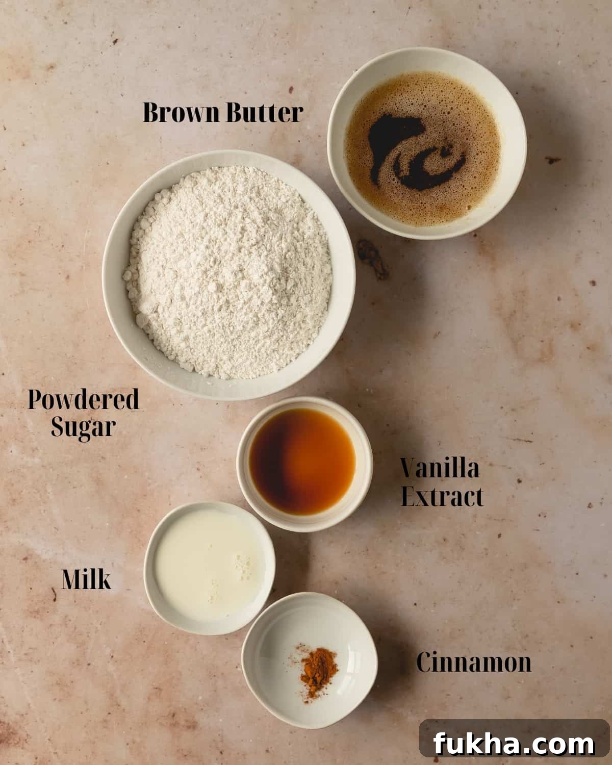 For the Brown Butter Glaze for Donuts:
Gather unsalted butter, powdered sugar, vanilla extract, cinnamon and milk. As an optional topping, gather banana chips. 
