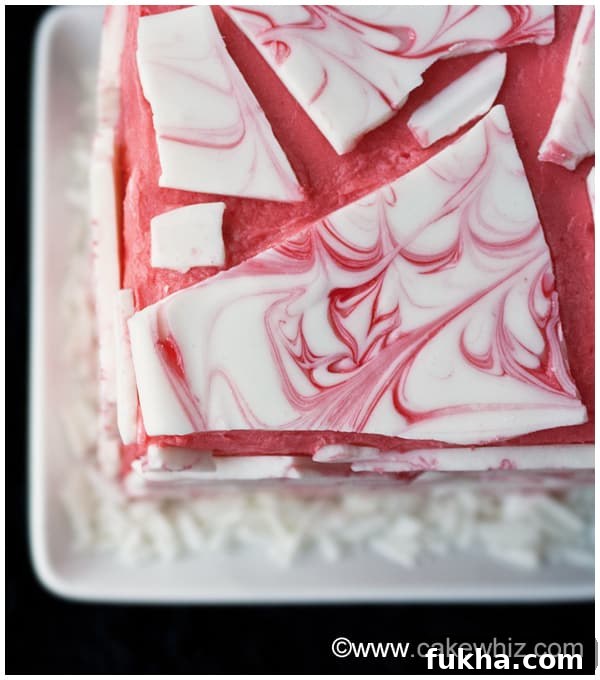 Closeup Shot of White Chocolate Bark on Top of Pink Frosting