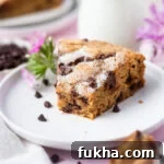 Single Layer Cake Recipes Without Frosting 4 slice of chocolate chip snack cake on a plate with pink flowers