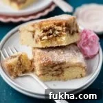 Single Layer Cake Recipes Without Frosting 7 two slices of churro cake on a plate with a fork