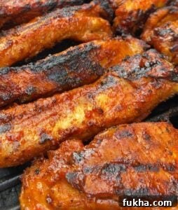 Dwaeji Galbi Pork Ribs Recipe (Ham Ji Park Copycat) 6 Grilled ribs being basted