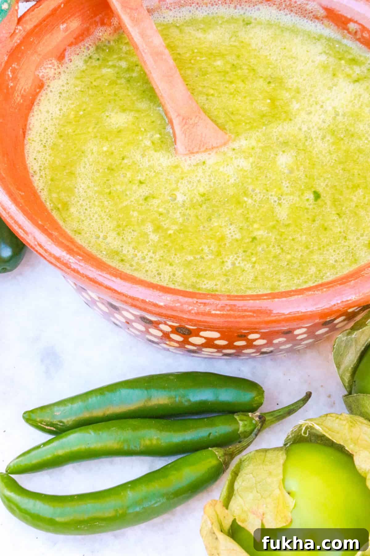 Taqueria-Style Salsa Verde for Tacos 5 Side view of salsa verde taquera in a Mexican clay bowl