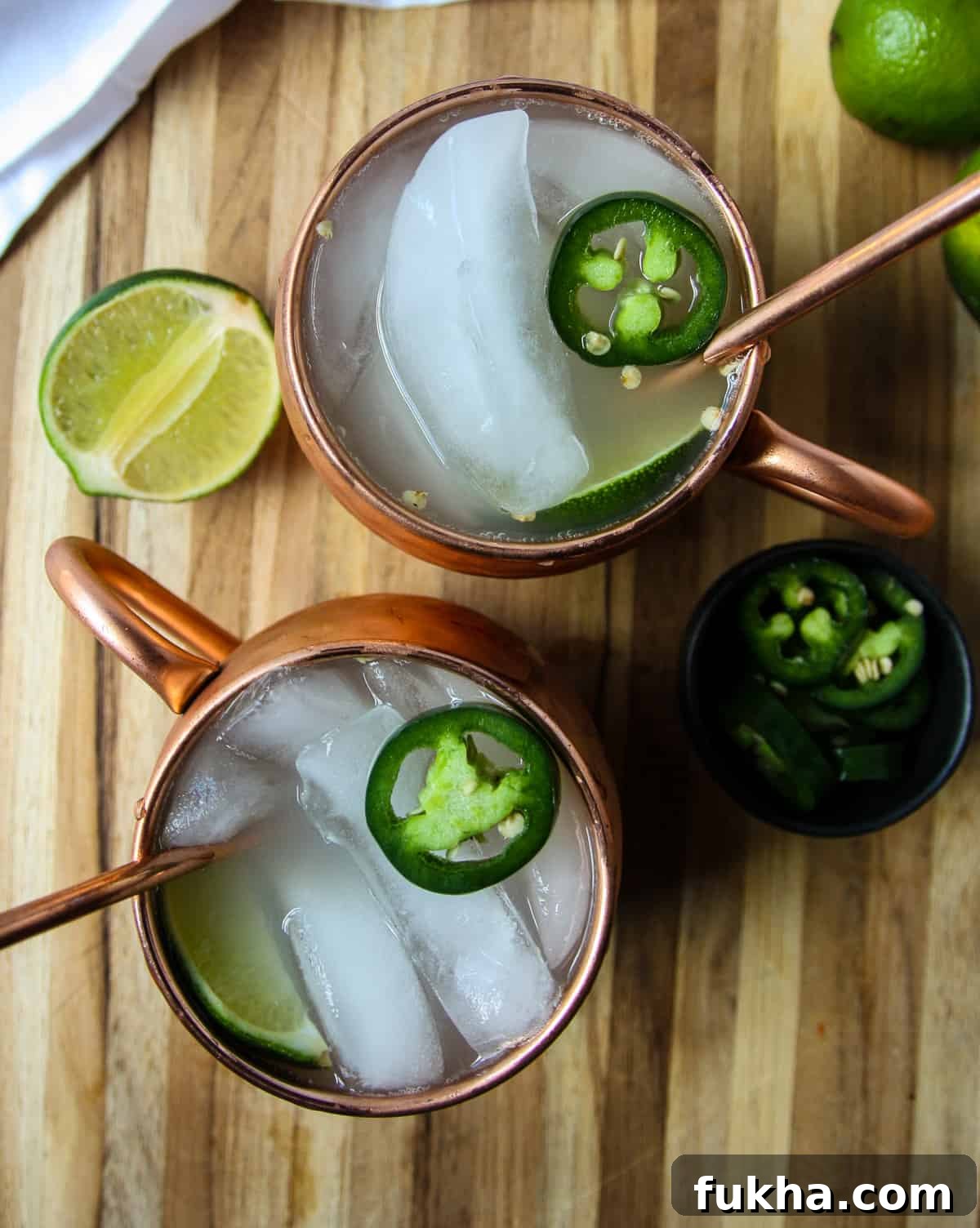 Two Mexican Mule beverages in copper mugs.