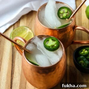 Two Mexican Mule Cocktails in copper mugs.