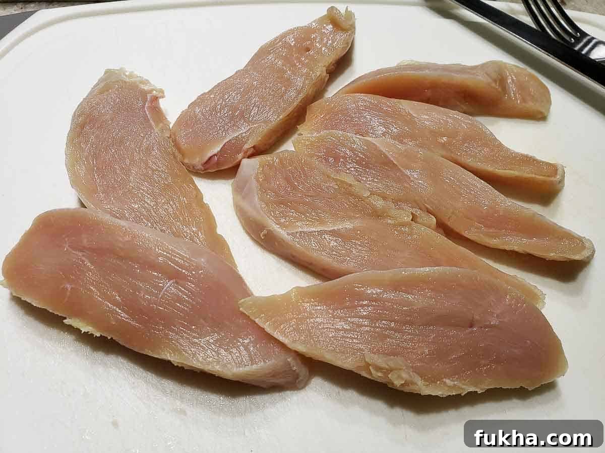 chicken breast cut into chicken tender slices