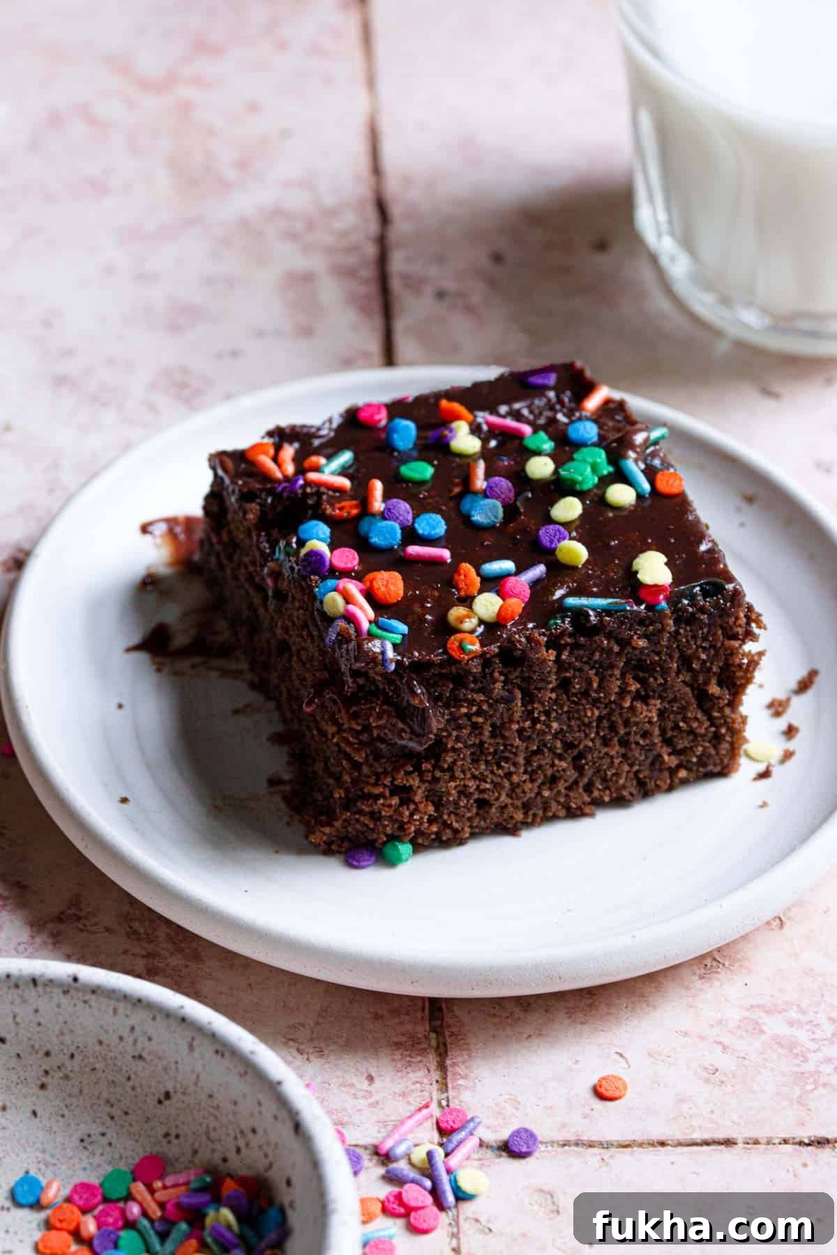A slice of cake on a plate.