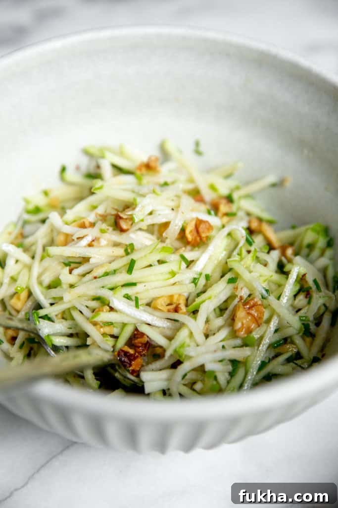 Close-up of the apple slaw in a bowl.