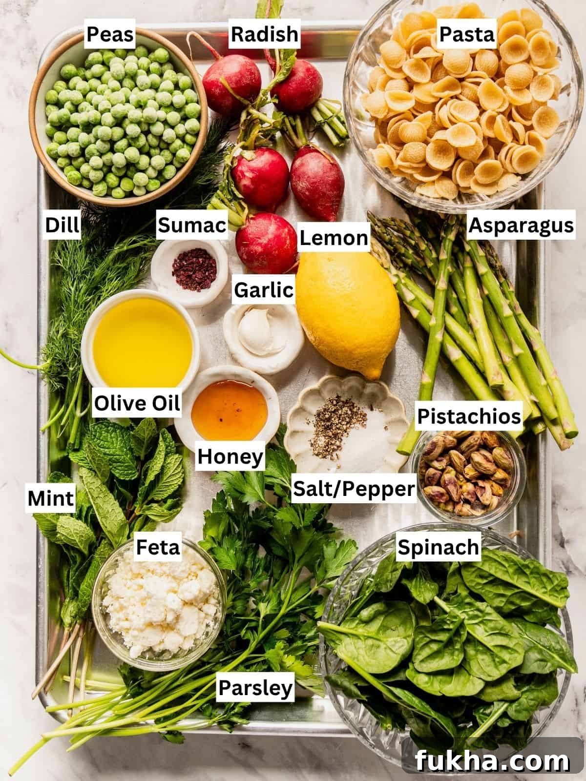 Spring Pasta Salad recipe ingredients with individual labels on a metal tray.