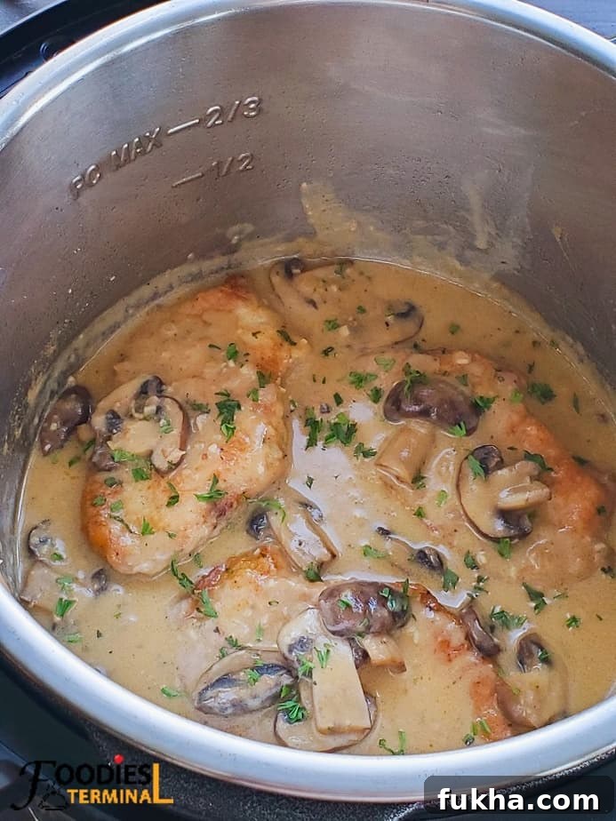 Pork chop marsala in instant pot with creamy mushroom sauce