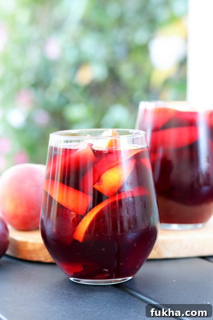 Refreshing Summer Sangria with Fresh Citrus and Berries 2 sangria on table