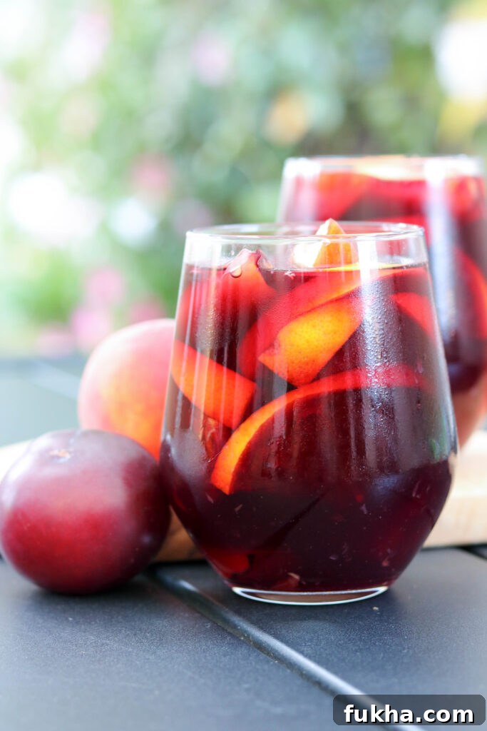 Refreshing Summer Sangria with Fresh Citrus and Berries 4 sangria on table