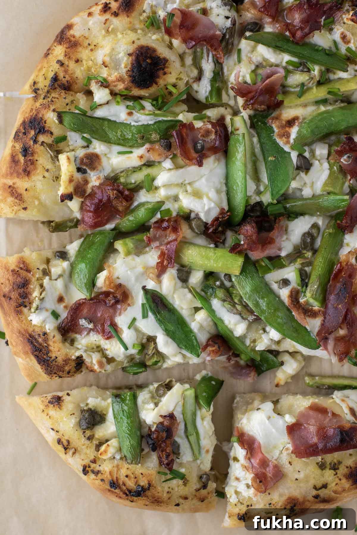 overhead shot of sliced spring pizza