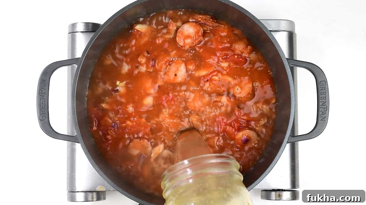 Adding chicken stock to tomato based pasta sauce