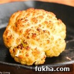 Roasted Whole Cauliflower with Pistachio Herb Sauce - this is so easy and makes a beautiful presentation at the table