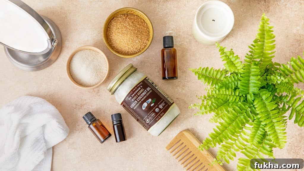DIY Coconut Sugar Scrub for Glowing Skin 3 Dr. Bronner's coconut oil, bowls of sugar, and essential oils on a brown countertop. GIY Coconut Sugar Scrub