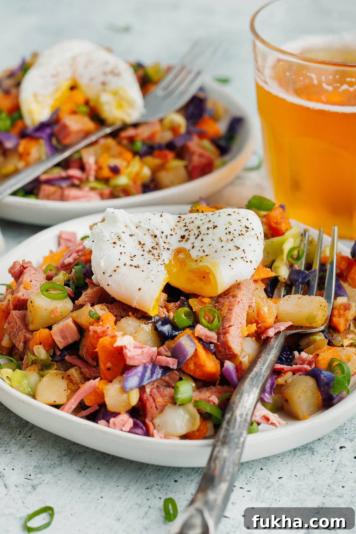 Crispy Corned Beef Hash with Poached Eggs 12 This is a picture of the corned beef hash topped with a poached egg.