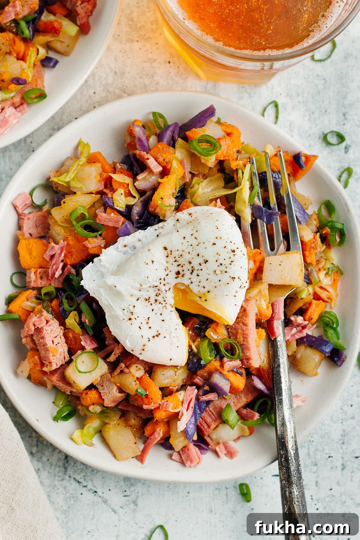 Crispy Corned Beef Hash with Poached Eggs 13 This is a picture of the corned beef hash topped with a poached egg.