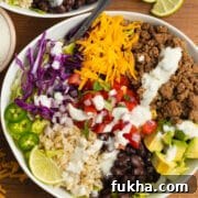 This is a square picture of a beef taco bowl.