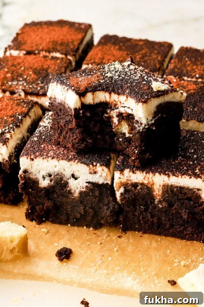 Tiramisu brownies slice and close up with a bite taken out