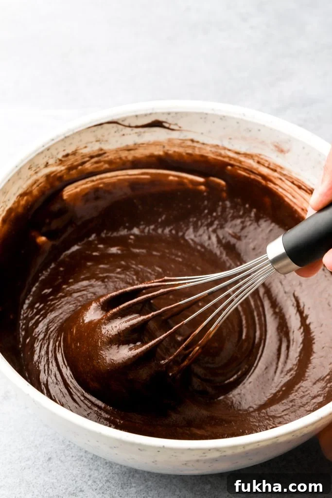 chocolate and butter mixed into egg mixture