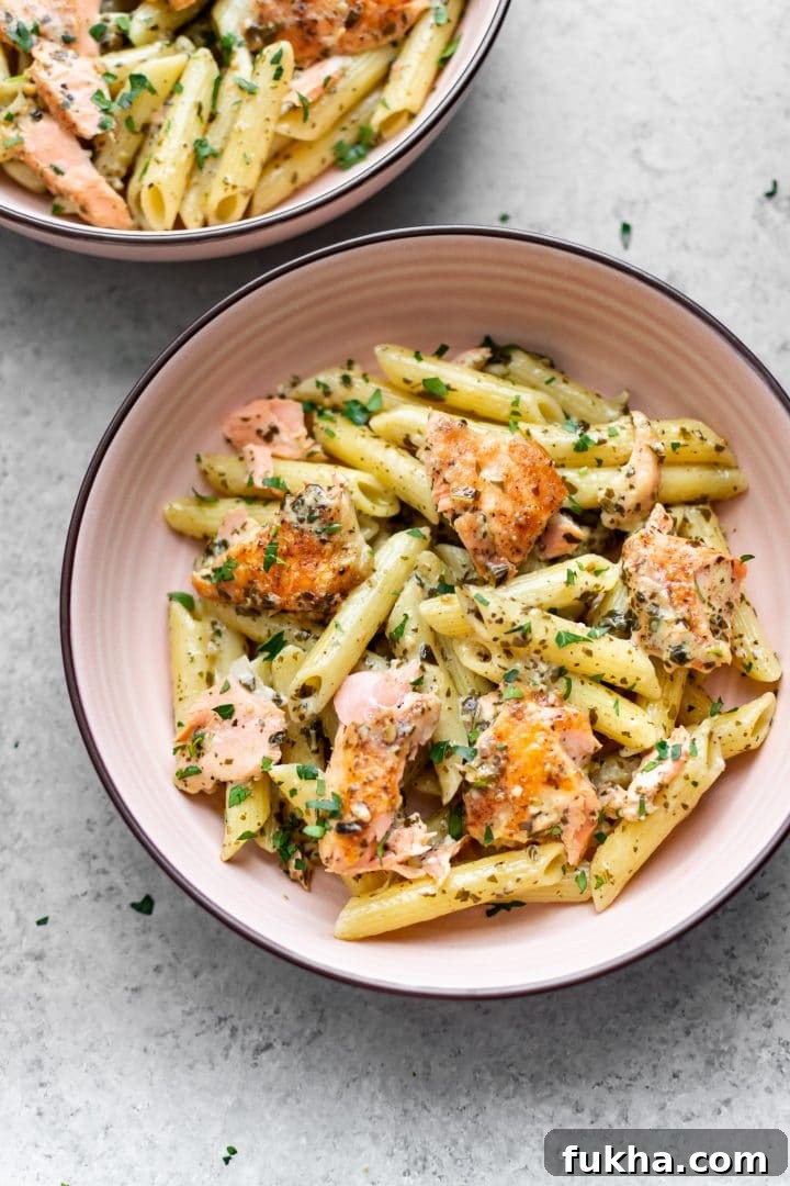basil pesto salmon pasta in two bowls
