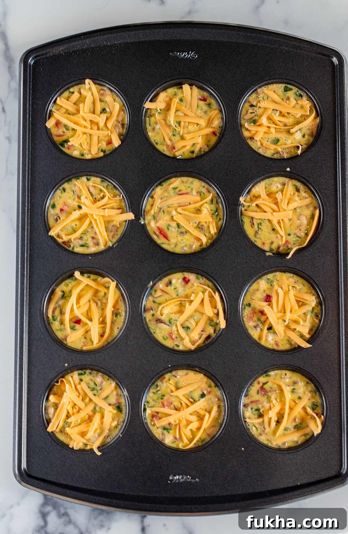 Sourdough Starter Breakfast Bites Recipe 7 Sourdough breakfast bites divided in a 12 muffin pan