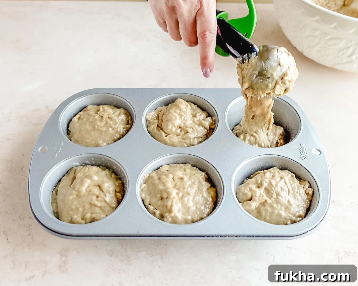 Fill muffin cups almost to the top.