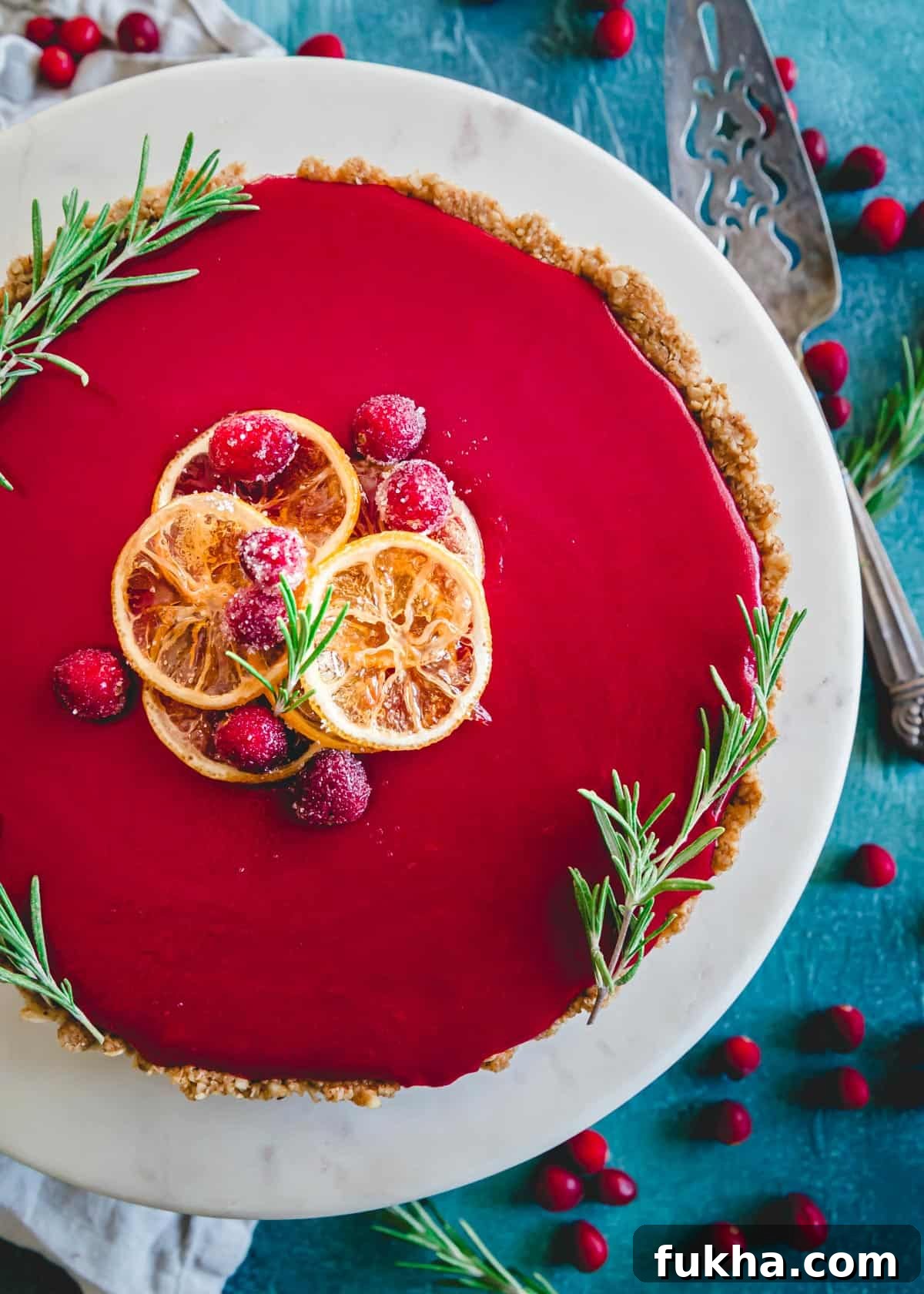 Garnished and fully set cranberry curd tart before serving.