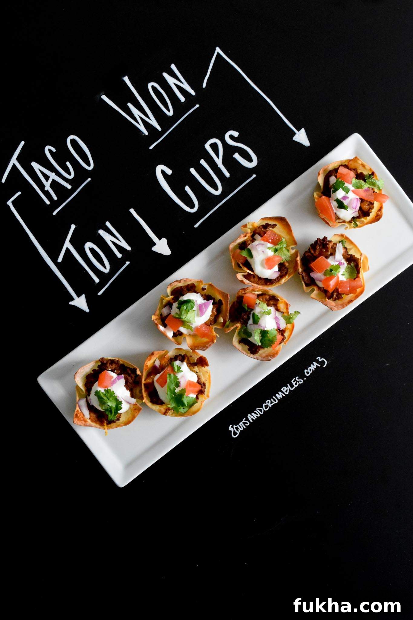 Taco Wonton Cups Recipe for Parties 2 taco won ton cups with title written on chalkboard