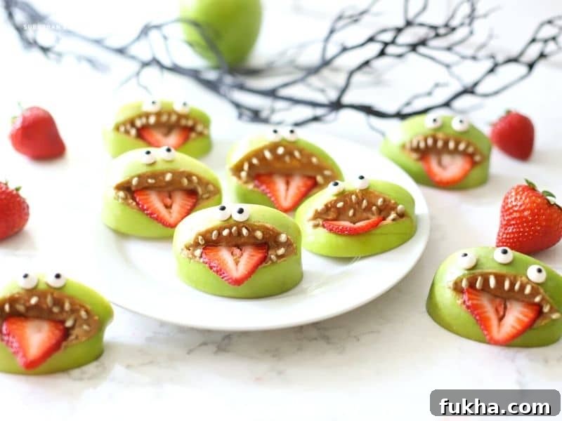 Apple mouths with teeth on a plate