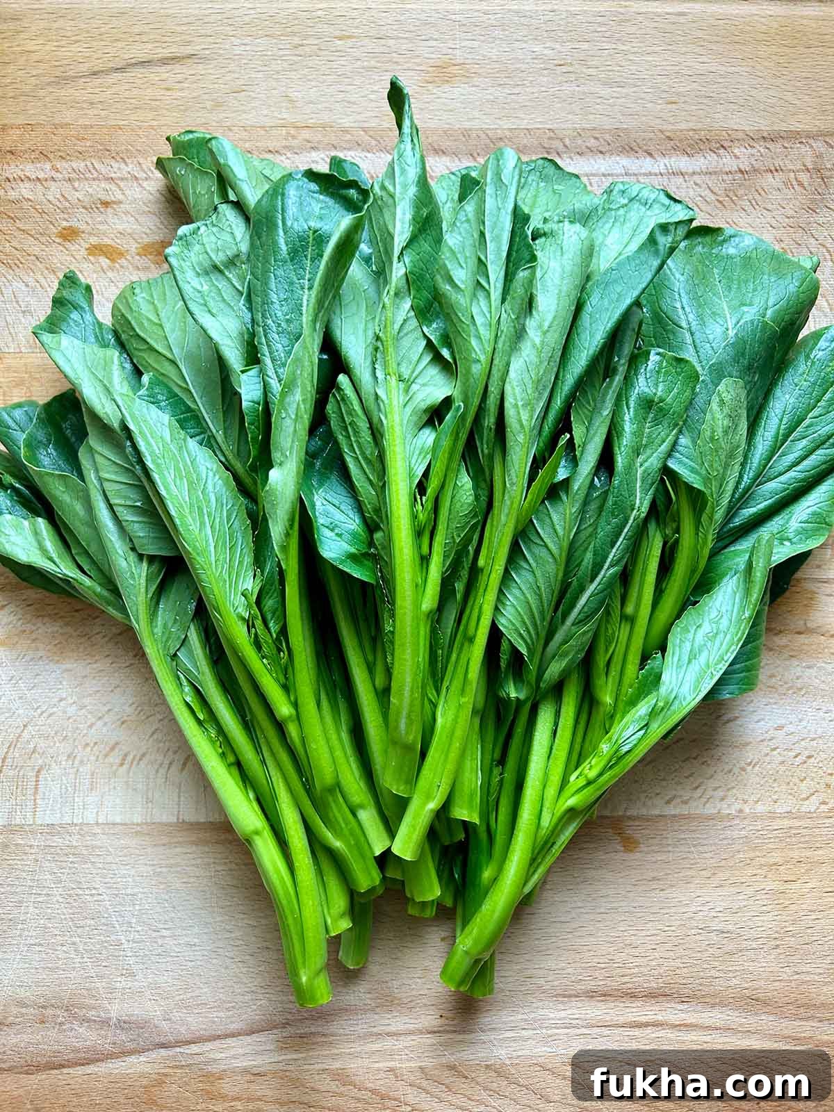 raw veggies on cutting board