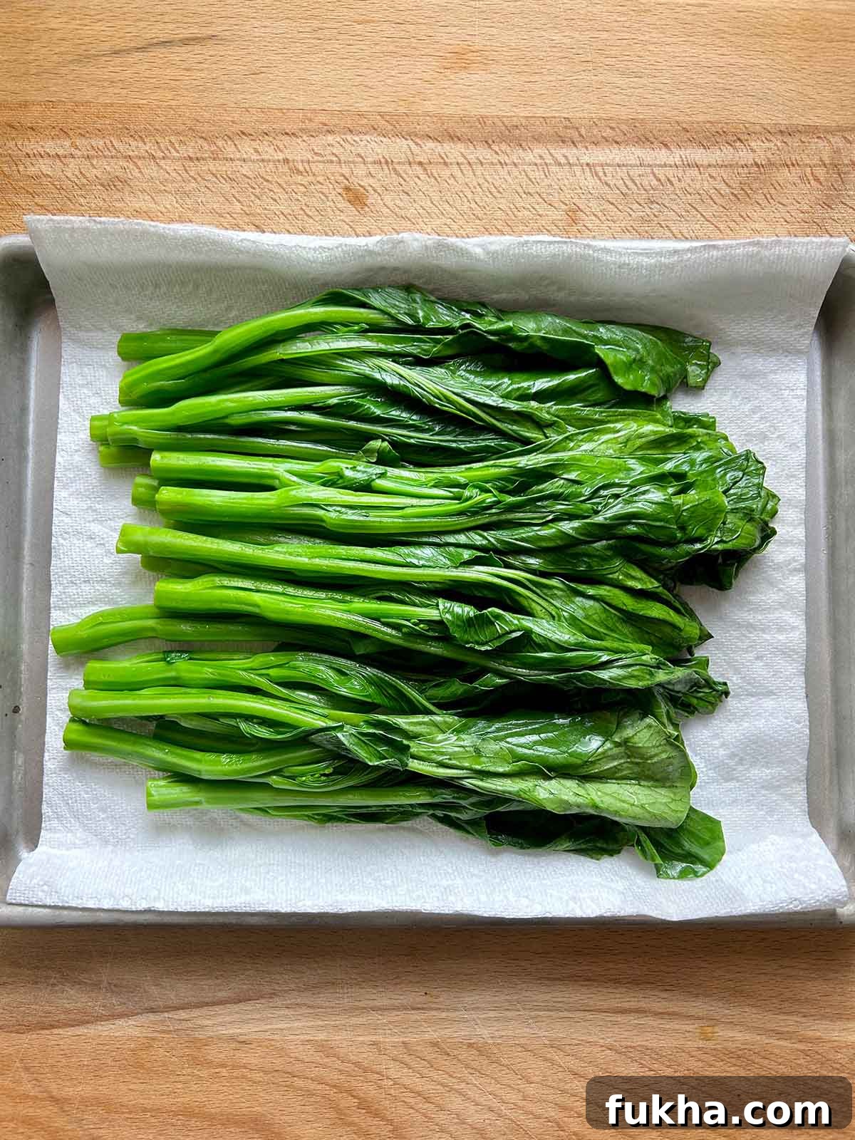 blanched veggies on baking sheet